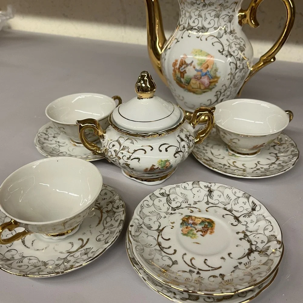 Elegant Gold and White Tea Set